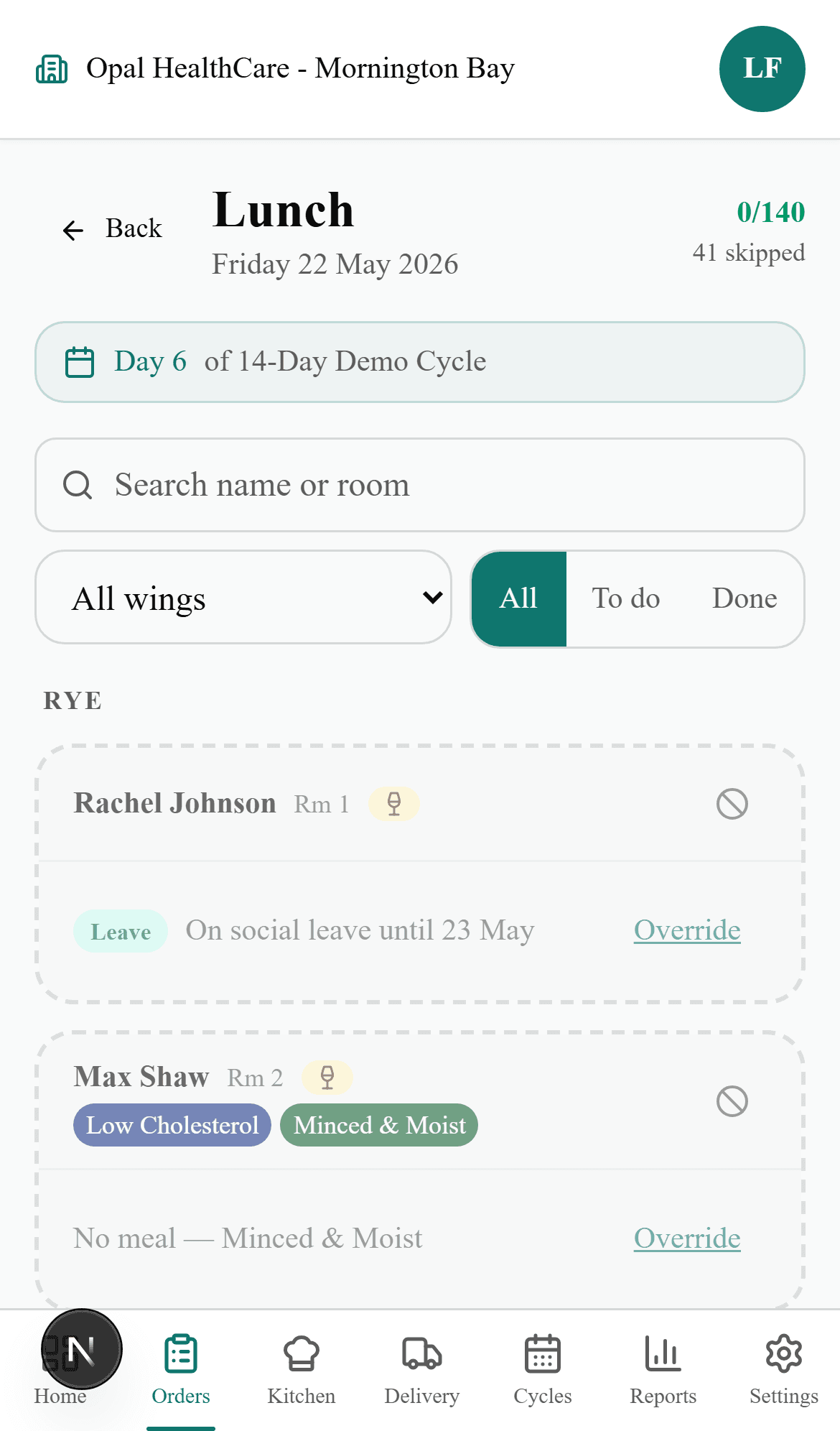 PCA taking lunch orders on an iPhone — resident list with dietary tags